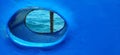 BullÃÂ´s eye, porthole, round window on a blue boat, ship, ferry Royalty Free Stock Photo