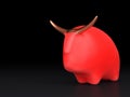 Bull stands on a table, red ceramic material. Black background.