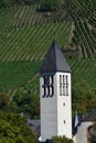 Bullay, Germany - 09 08 2020: church tower of Bullay in front of the vineyards Royalty Free Stock Photo