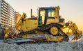 Bulldozer at the beach, ground moving equipment, heavy machinery, groundwork industry