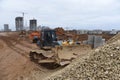 Bulldozer with bucket for pool excavation and utility trenching. Dozers during land clearing and foundation digging.