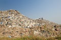 Bulldozer buries food and industrial wastes