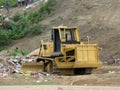 A bulldozer at the city dump,generative ai