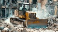 A bulldozer clearing debris and rubble from the work site creating a path for the workers and machinery Royalty Free Stock Photo