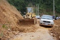 Bulldozer clears the road