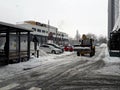 Bulldozer clening road after snowstorm