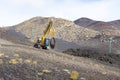 Bulldozer transporting heavyweight cables 