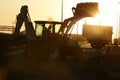 Bulldozer excavator backlight evening sunset