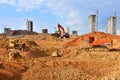 Bulldozer and excavator for earthworks at construction site. Earth-moving equipment Royalty Free Stock Photo