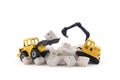 Bulldozer and excavator working on computer keys on white background Royalty Free Stock Photo