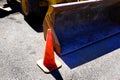 Bulldozer Heavy Equipment and Orange Cone Street Repair