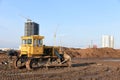 Bulldozer during of large construction jobs at building site. Crawler tractor dozer for earth-moving. Royalty Free Stock Photo