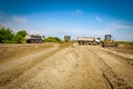 Bulldozer machine is leveling construction site Royalty Free Stock Photo