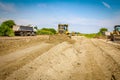 Bulldozer machine is leveling construction site Royalty Free Stock Photo