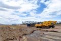 Bulldozer in the middle of a construction.