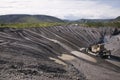 Bulldozer in the mountains of Eastern Siberia / Earthworks / Mining Royalty Free Stock Photo