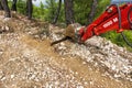 Bulldozer in the mountains. Penteli Mountain of Greece