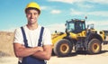 Bulldozer with pointing latin american construction worker