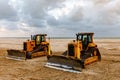 Bulldozer Prepares The Sea Beach For The Season.