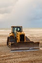 Bulldozer Prepares The Sea Beach For The Season.