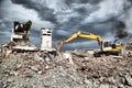 Bulldozer removes the debris from demolition of derelict buildings Royalty Free Stock Photo