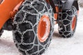 Bulldozer tires with snow chains