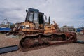 Bulldozers at Hastings fishing boats on the beach at Rock-a-Nore