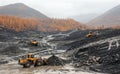 Bulldozers and Wheel Loaders in the mountains of Eastern Siberia / Earthworks / Mining Royalty Free Stock Photo