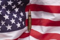 Bullet ammunition on a United states stars and stripes flag