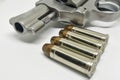 Bullet close-up on 38 Super ammo with a handgun on white background Royalty Free Stock Photo