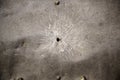 Bullet hole with cobwebs Royalty Free Stock Photo