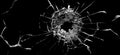 Bullet hole in the glass. Isolated on a black background. Royalty Free Stock Photo