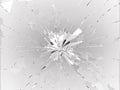 Bullet hole pieces of shattered or smashed glass Royalty Free Stock Photo