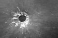 The bullet hole shot black and white