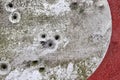 Bullet holes in a german traffic sign from a gun shooting exercise