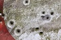 Bullet holes in a german traffic sign from a gun shooting exercise