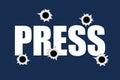 Bullet holes on the PRESS sign as metaphor of Killing, shooting and murdering of journalist and reporter Royalty Free Stock Photo