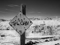 Bullet holes in the slow sign. Infrared