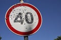 Bullet holes on the speed limit road sign. Royalty Free Stock Photo