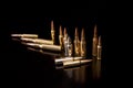 Bullet isolated on black background with reflexion. Rifle bullets close-up on black back. Cartridges for rifle and carbine on a Royalty Free Stock Photo