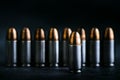 Bullet 9mm. On the dark stone table.rounds and military technology Royalty Free Stock Photo