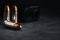 Bullet 9mm. On the dark stone table.rounds and military technology Royalty Free Stock Photo