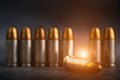 Bullet 9mm. On the dark stone table.rounds and military technology Royalty Free Stock Photo