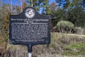 A bullet-riddled sign marks the spot near Hahira  Georgia  where Mary Turner was lynched in 1918. Royalty Free Stock Photo
