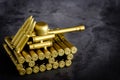 Bullet shell toy tank on a black background closeup view