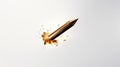 Bullet in slow motion, leaving a trail of fire, smoke and debris behind it. Exploding projectile. A rifle round in mid Royalty Free Stock Photo