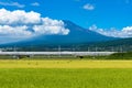 Bullet train, Shinkansen travels below Mt. Fuji in Japan