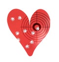 Bulletholes in a metal heart-shaped target Royalty Free Stock Photo