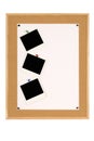 Vertical row of Polaroid photo prints on cork notice board, blank white poster paper, copy space Royalty Free Stock Photo