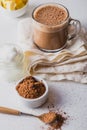 BULLETPROOF CACAO. Ketogenic keto diet hot drink. Cacao blended with coconut oil and butter. Cup of bulletproof cacao Royalty Free Stock Photo